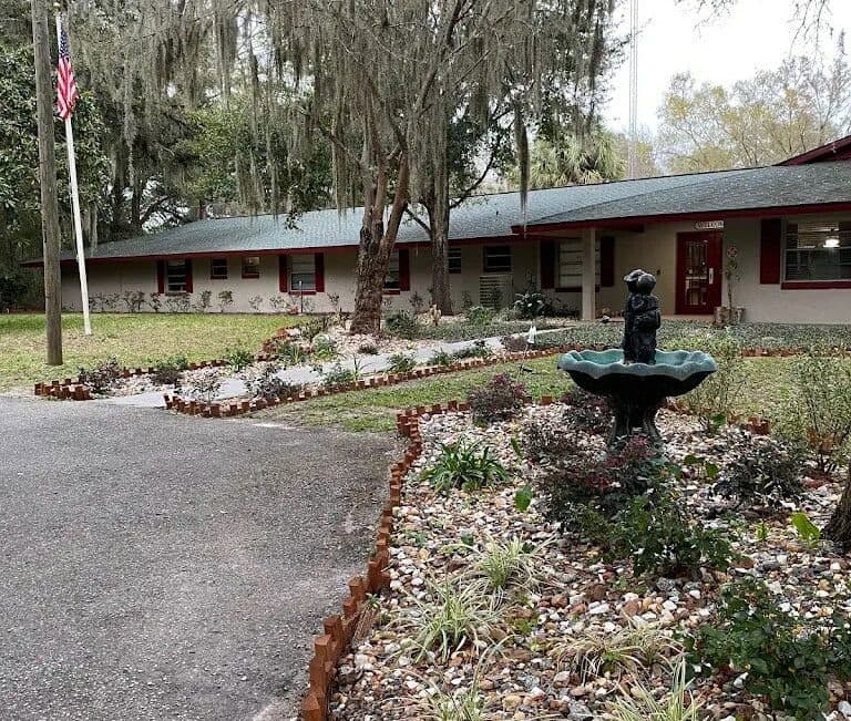 A front garden and fountain at the entrance to a community